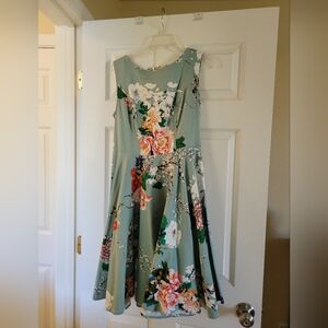 Womens Dress size L, lovely floral pattern with a full skirt.